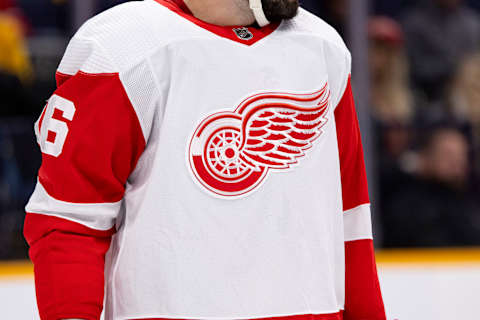 NASHVILLE, TN – MARCH 14: Detail of the Detroit Red Wings logo on a players sweater during the first period against the Nashville Predators at Bridgestone Arena on March 14, 2023 in Nashville, Tennessee. (Photo by Brett Carlsen/Getty Images)