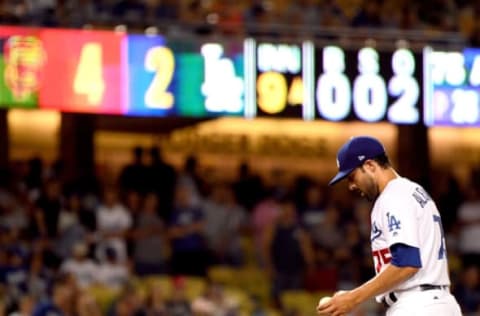 LOS ANGELES, CA – AUGUST 13: Scott Alexander #75 of the Los Angeles Dodgers reacts trailing 4-2 to the San Francisco Giants during the ninth inning at Dodger Stadium on August 13, 2018 in Los Angeles, California. (Photo by Harry How/Getty Images)