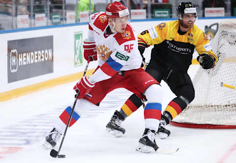 SOCHI, RUSSIA – APRIL 7, 2018: Yegor Korshkov (L) of the Russian Olympic men’s ice hockey team and Germanys Pascal Zerressen in their 2018 Euro Hockey Challenge second leg ice hockey match at Bolshoy Ice Dome. Anton Novoderezhkin/TASS (Photo by Anton NovoderezhkinTASS via Getty Images)