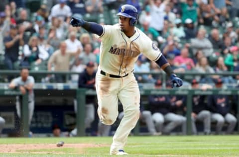 SEATTLE, WA – MAY 20: Jean Segura #2 celebrates of the Seattle Mariners points to the dugout after hitting a walk off single to defeat the Detroit Tigers 3-2 in the eleventh inning during their game at Safeco Field on May 20, 2018 in Seattle, Washington. (Photo by Abbie Parr/Getty Images)