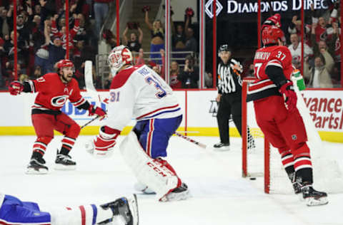 RALEIGH, NC – MARCH 24: Carolina Hurricanes Left Wing Andrei Svechnikov (37) celebrates after scoring the game winning goal in overtime on Montreal Canadiens Goalie Carey Price (31) during a game between the Montreal Canadiens at the Carolina Hurricanes at the PNC Arena in Raleigh, NC on March 24, 2019. (Photo by Greg Thompson/Icon Sportswire via Getty Images)