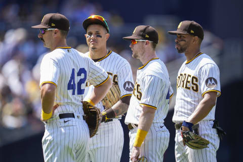 Apr 15, 2023; San Diego, California, USA; San Diego Padres infield members wait during a pitching change against the Milwaukee Brewers during the fourth inning at Petco Park. Mandatory Credit: Ray Acevedo-USA TODAY Sports