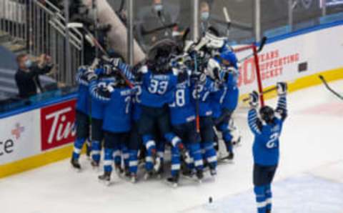 EDMONTON, AB – JANUARY 05: Finland celebrates victory over Russia during the 2021 IIHF World Junior Championship bronze medal game at Rogers Place on January 5, 2021 in Edmonton, Canada. (Photo by Codie McLachlan/Getty Images)