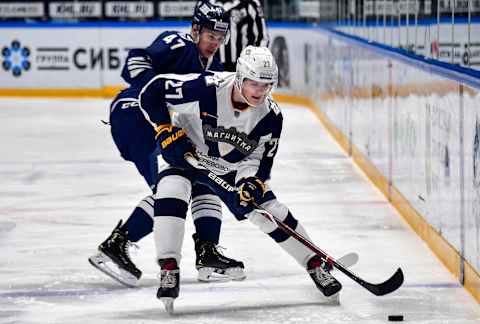 VLADIVOSTOK, RUSSIA NOVEMBER 21, 2019: HC Metallurg Magnitogorsk’s Pavel Dorofeyev (front) and HC Admiral Vladivostok’s Ivan Mishchenko in action in their 2019/20 KHL Regular Season ice hockey match, at the Fetisov Arena. Yuri Smityuk/TASS (Photo by Yuri Smityuk\TASS via Getty Images)