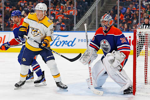 Nov 4, 2023; Edmonton, Alberta, CAN; Nashville Predators forward Juuso Parssinen (75) looks for a deflection in front of Edmonton Oilers goaltender Jack Campbell (36) during the second period at Rogers Place. Mandatory Credit: Perry Nelson-USA TODAY Sports