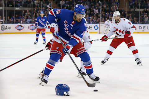 Apr 26, 2022; New York, New York, USA; New York Rangers defenseman K’Andre Miller (79) controls the puck against the Carolina Hurricanes during the first period at Madison Square Garden. Mandatory Credit: Tom Horak-USA TODAY Sports