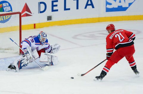 NEW YORK, NY – FEBRUARY 08: Carolina Hurricanes Left Wing Nino Niederreiter (21) takes a breakaway shot on goal during the first period of the National Hockey League game between the Carolina Hurricanes and the New York Rangers on February 8, 2019 at Madison Square Garden in New York, NY. (Photo by Joshua Sarner/Icon Sportswire via Getty Images)