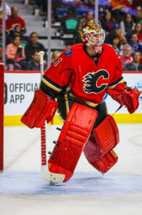 Sep 30, 2016; Calgary, Alberta, CAN; Calgary Flames goalie Brian Elliott (1) against Vancouver Canucks during a preseason hockey game at Scotiabank Saddledome. Calgary Flames won 2-1. Mandatory Credit: Sergei Belski-USA TODAY Sports