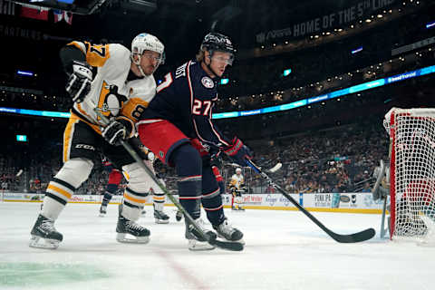 COLUMBUS, OHIO – APRIL 13: Sidney Crosby #87 of the Pittsburgh Penguins and Adam Boqvist #27 of the Columbus Blue Jackets battle for position during the first period at Nationwide Arena on April 13, 2023 in Columbus, Ohio. (Photo by Jason Mowry/Getty Images)