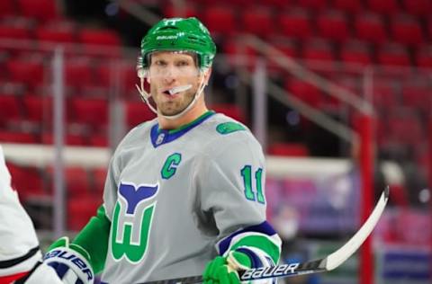 Feb 19, 2021; Raleigh, North Carolina, USA; Carolina Hurricanes center Jordan Staal (11) looks on against the Chicago Blackhawks at PNC Arena. Mandatory Credit: James Guillory-USA TODAY Sports