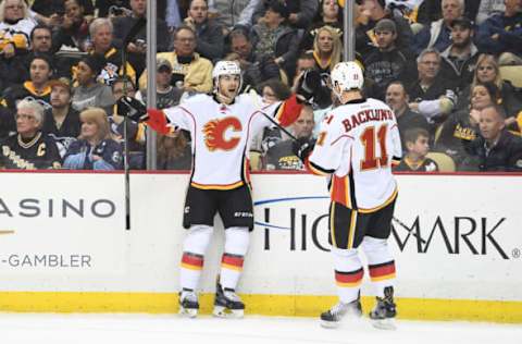 PITTSBURGH, PA – FEBRUARY 07: Calgary Flames right wing Michael Frolik #67 reacts with center Mikael Backlund #11 after scoring a goal. (Photo by Justin Berl/Icon Sportswire via Getty Images)