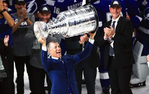 Julien BriseBois, General Manager and Alternate Governor of the Tampa Bay Lightning celebrates with the Stanley Cup following the victory over the Montreal Canadiens in Game Five of the 2021 NHL Stanley Cup Final (Photo by Mike Ehrmann/Getty Images)