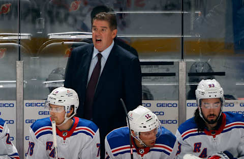 NEWARK, NEW JERSEY – OCTOBER 04: Head coach Peter Laviolette of New York Rangers handles the bench during the game against the New Jersey Devils at Prudential Center on October 04, 2023 in Newark, New Jersey. (Photo by Bruce Bennett/Getty Images)