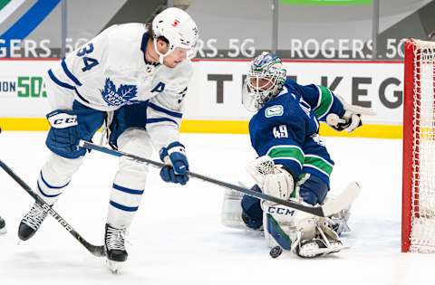 Braden Holtby stops Auston Matthews. (Photo by Rich Lam/Getty Images)