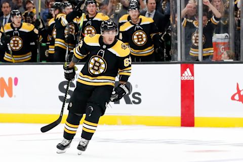 BOSTON, MA – OCTOBER 12: Boston Bruins left wing Brad Marchand (63) reacts to his opening goal during a game between the Boston Bruins and the New Jersey Devils on October 12, 2019, at TD Garden in Boston, Massachusetts. (Photo by Fred Kfoury III/Icon Sportswire via Getty Images)