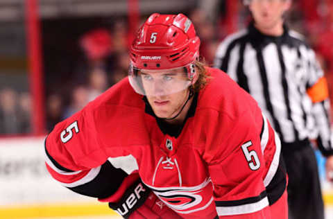 RALEIGH, NC – MARCH 26: Noah Hanifin #5 of the Carolina Hurricanes prepares for a faceoff during an NHL game on March 26, 2016 at PNC Arena in Raleigh, North Carolina. (Photo by Phil Ellsworth/NHLI via Getty Images)