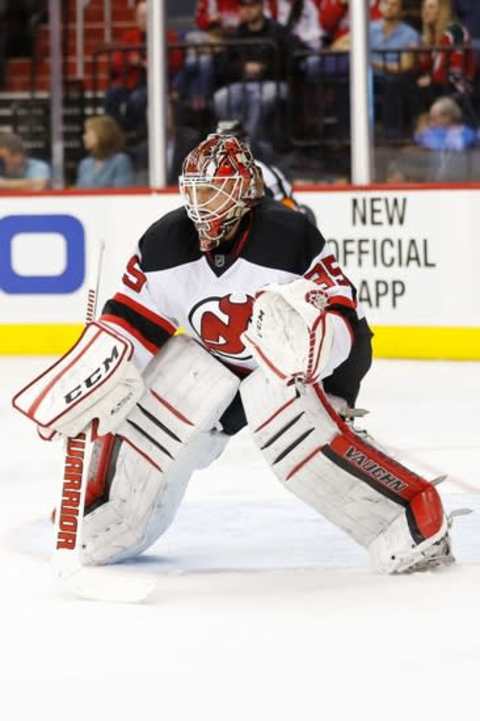 Feb 20, 2016; Washington, DC, USA; New Jersey Devils goalie Cory Schneider (35) follows the puck against the Washington Capitals at Verizon Center. Mandatory Credit: Geoff Burke-USA TODAY Sports