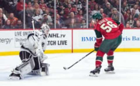 Oct 18, 2016; Saint Paul, MN, USA; Los Angeles Kings goalie Jeff Zatkoff (37) makes a save on Minnesota Wild forward Erik Haula (56) during the first period at Xcel Energy Center. Mandatory Credit: Brace Hemmelgarn-USA TODAY Sports