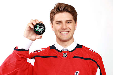 DALLAS, TX – JUNE 23: Mitchell Gibson poses after being selected 124th overall by the Washington Capitals during the 2018 NHL Draft at American Airlines Center on June 23, 2018 in Dallas, Texas. (Photo by Tom Pennington/Getty Images)