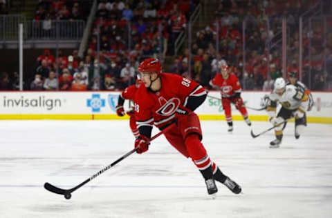 RALEIGH, NORTH CAROLINA – JANUARY 25: Martin Necas #88 of the Carolina Hurricanes skates with the puck during the first period of the game against the Vegas Golden Knights at PNC Arena on January 25, 2022, in Raleigh, North Carolina. (Photo by Jared C. Tilton/Getty Images)