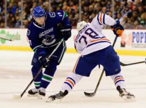 Dec 26, 2015; Vancouver, British Columbia, CAN; Edmonton Oilers forward Lauri Korpikoski (28) skates against Vancouver Canucks forward Radim Vrbata (17) during the first period at Rogers Arena. The Vancouver Canucks won 2-1 in overtime. Mandatory Credit: Anne-Marie Sorvin-USA TODAY Sports