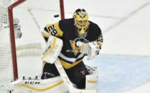 May 22, 2016; Pittsburgh, PA, USA; Pittsburgh Penguins goalie Marc-Andre Fleury (29) tries to make a save as the puck hits off the post on a Tampa Bay Lightning shot during the third period in game five of the Eastern Conference Final of the 2016 Stanley Cup Playoffs at Consol Energy Center. Tampa Bay won 4-3 in OT. Mandatory Credit: Don Wright-USA TODAY Sports