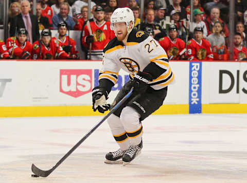 Feb 22, 2015; Chicago, IL, USA; Boston Bruins defenseman Dougie Hamilton (27) with the puck during the second period against the Chicago Blackhawks at the United Center. Mandatory Credit: Dennis Wierzbicki-USA TODAY Sports