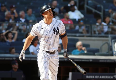 Sep 18, 2021; Bronx, New York, USA; New York Yankees designated hitter Giancarlo Stanton (27) hits a two run home run against the Cleveland Indians during the seventh inning at Yankee Stadium. Mandatory Credit: Andy Marlin-USA TODAY Sports