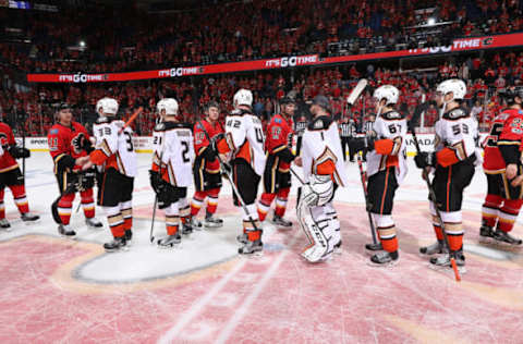 CALGARY, AB – APRIL 19: Teammates of the Calgary Flames shakes hands with teammates of the Anaheim Ducks after Game Four of the Western Conference First Round during the 2017 NHL Stanley Cup Playoffs on April 19, 2017 at the Scotiabank Saddledome in Calgary, Alberta, Canada. (Photo by Gerry Thomas/NHLI via Getty Images)