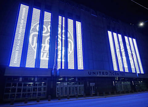 CHICAGO, ILLINOIS – APRIL 09: A general view of the United Center with blue lights on April 09, 2020 in Chicago, Illinois. Landmarks and buildings across the nation are displaying blue lights to show support for health care workers and first responders on the front lines of the COVID-19 pandemic. (Photo by Jonathan Daniel/Getty Images)