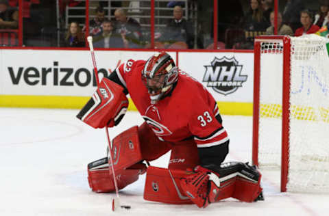 RALEIGH, NC – NOVEMBER 13:Carolina Hurricanes Goalie Scott Darling (33) blocks the puck during the 1st period of the Carolina Hurricanes versus the Dallas Stars on November 13, 2017, at PNC Arena in Raleigh, NC. (Photo by Jaylynn Nash/Icon Sportswire via Getty Images)