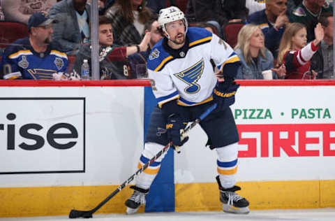 GLENDALE, ARIZONA – DECEMBER 31: Justin Faulk #72 of the St. Louis Blues looks to pass during the NHL game aph at Gila River Arena on December 31, 2019 in Glendale, Arizona. The Coyotes defeated the Blues 3-1. (Photo by Christian Petersen/Getty Images)