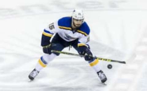 May 25, 2016; San Jose, CA, USA; St. Louis Blues center Robby Fabbri (15) gathers the puck against San Jose Sharks in the first period of game six in the Western Conference Final of the 2016 Stanley Cup Playoffs at SAP Center at San Jose. Mandatory Credit: John Hefti-USA TODAY Sports