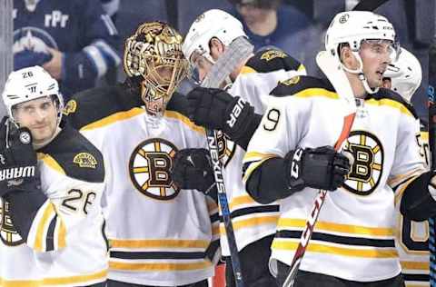 NHL Power Rankings: Boston Bruins goalie Tuukka Rask (40) celebrates a victory over the Winnipeg Jets after the third period at the MTS Centre. Boston won 4-1. Mandatory Credit: Bruce Fedyck-USA TODAY Sports