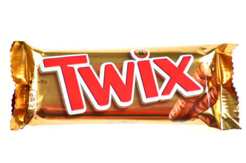 A Twix bar on a white background.