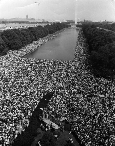 Over 200,000 people gather around the Lincoln Memorial in Washington, D.C., where the 1963 civil rights March on Washington ended with Martin Luther King's "I Have A Dream" speech.