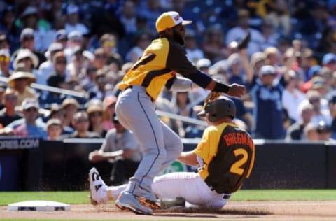 Jul 10, 2016; San Diego, CA, USA; World infielder Alex Bregman (2) slides into third base with a triple past World infielder Yandy Diaz (left) in the first inning during the All Star Game futures baseball game at PetCo Park. Mandatory Credit: Gary A. Vasquez-USA TODAY Sports