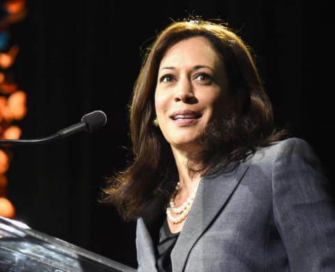 Kamala Harris speaking onstage in 2014