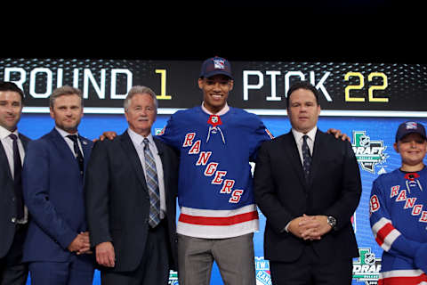 DALLAS, TX – JUNE 22: K’Andre Miller poses after being selected twenty-second overall by the New York Rangers during the first round of the 2018 NHL Draft at American Airlines Center on June 22, 2018 in Dallas, Texas. (Photo by Bruce Bennett/Getty Images)