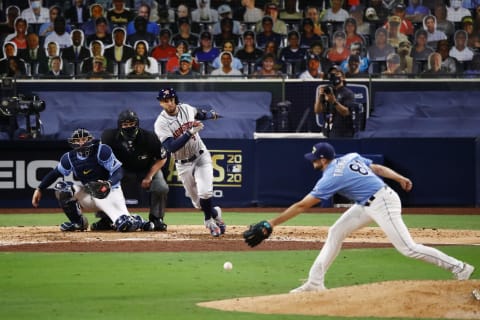 Ryan Thompson #81 of the Tampa Bay Rays attempts to field a hit by George Springer #4 of the Houston Astros during the seventh inning in game one of the American League Championship Series at PETCO Park on October 11, 2020 in San Diego, California. (Photo by Ezra Shaw/Getty Images)