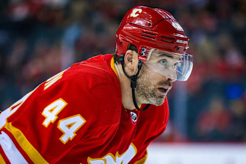 Dec 9, 2021; Calgary, Alberta, CAN; Calgary Flames defenseman Erik Gudbranson (44) during the face off against the Carolina Hurricanes during the third period at Scotiabank Saddledome. Mandatory Credit: Sergei Belski-USA TODAY Sports