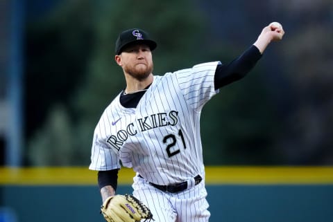 Apr 28, 2023; Denver, Colorado, USA; Colorado Rockies starting pitcher Kyle Freeland (21) delivers a pitch in the first inning against the Arizona Diamondbacks at Coors Field. Mandatory Credit: Ron Chenoy-USA TODAY Sports