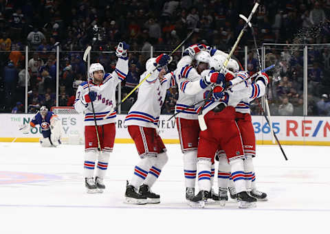 NEW YORK, NEW YORK – FEBRUARY 25: The New York Rangers celebrate their 4-3 overtime win against the New York Islanders at NYCB Live’s Nassau Coliseum on February 25, 2020 in Uniondale, New York. (Photo by Bruce Bennett/Getty Images)