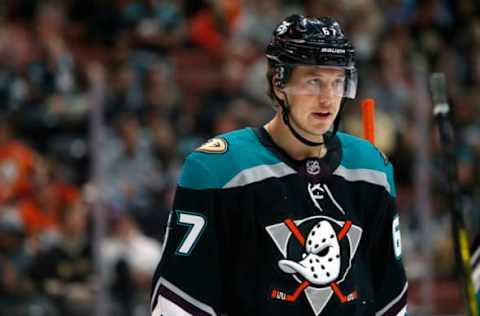 ANAHEIM, CALIFORNIA – MARCH 10: Rickard Rakell #67 of the Anaheim Ducks looks on between plays during a game against the Los Angeles Kings at Honda Center on March 10, 2019, in Anaheim, California. (Photo by Katharine Lotze/Getty Images)