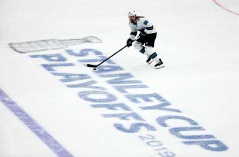 ST LOUIS, MISSOURI – MAY 15: Erik Karlsson #65 of the San Jose Sharks skates with the puck against the St. Louis Blues during the first period in Game Three of the Western Conference Finals during the 2019 NHL Stanley Cup Playoffs at Enterprise Center on May 15, 2019 in St Louis, Missouri. (Photo by Dilip Vishwanat/Getty Images)