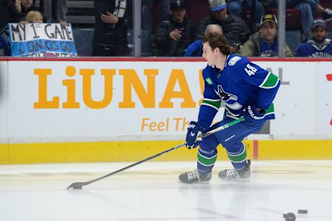 Cole McWard warming up prior to his Canucks debut. (Photo by Derek Cain/Getty Images)