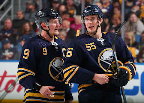 BUFFALO, NY – OCTOBER 14: Jack Eichel #9 and Rasmus Ristolainen #55 of the Buffalo Sabres talk strategy during a break in the action of an NHL game against the Dallas Stars on October 14, 2019 at KeyBank Center in Buffalo, New York. (Photo by Bill Wippert/NHLI via Getty Images)