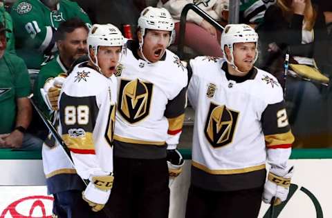 DALLAS, TX – OCTOBER 06: James Neal #18 of the Vegas Golden Knights celebrates with Nate Schmidt #88 of the Vegas Golden Knights and Oscar Lindberg #24 of the Vegas Golden Knights after scoring the first goal in team history against the Dallas Stars at American Airlines Center on October 6, 2017, in Dallas, Texas. (Photo by Tom Pennington/Getty Images)