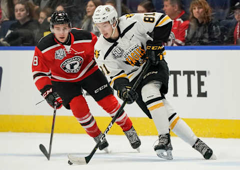 QUEBEC CITY, QC – OCTOBER 11: Mathias Laferriere #81 of the Cap Breton Screaming Eagles skates with the puck against the Quebec Remparts during their QMJHL hockey game at the Videotron Center on October 11, 2018 in Quebec City, Quebec, Canada. (Photo by Mathieu Belanger/Getty Images)