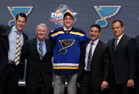 Jun 24, 2016; Buffalo, NY, USA; Tage Thompson poses for a photo after being selected as the number twenty-six overall draft pick by the St. Louis Blues in the first round of the 2016 NHL Draft at the First Niagra Center. Mandatory Credit: Timothy T. Ludwig-USA TODAY Sports